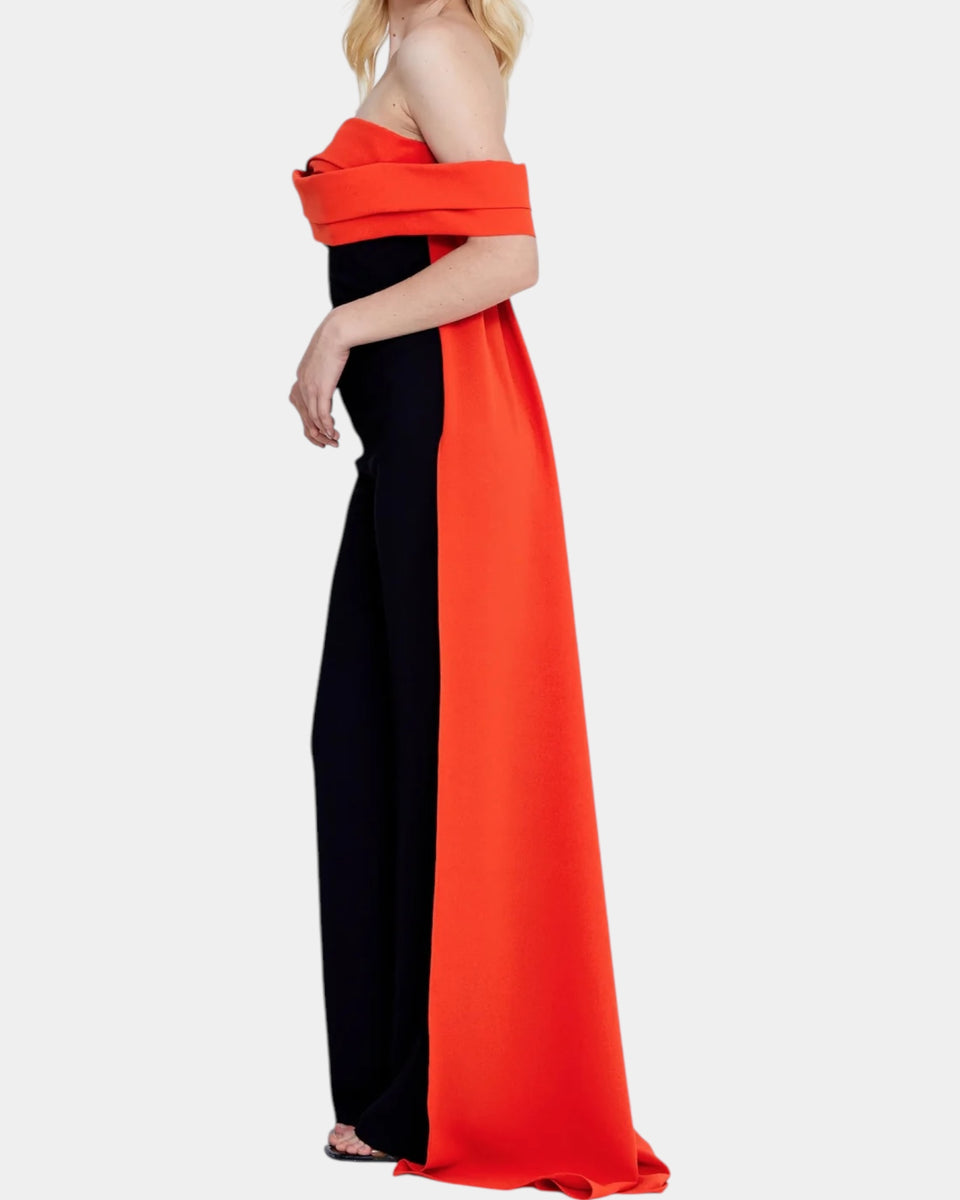 Combinaison avec cape longue couleur noir et orange